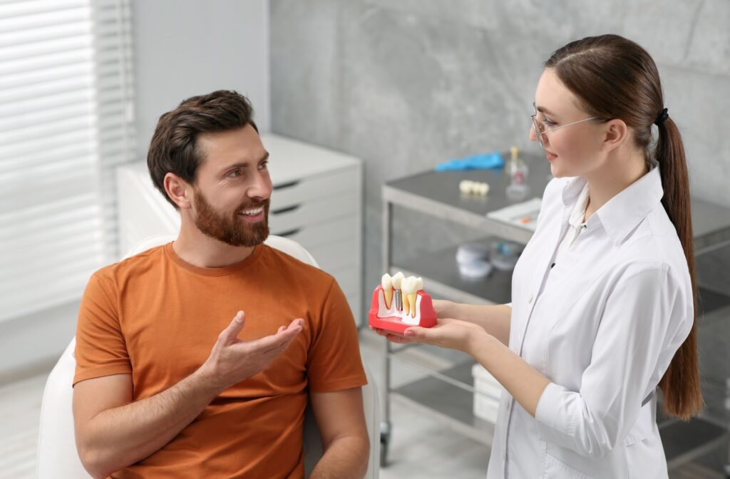 Patient asking about cavities and if they're contagious during regular dental check up.